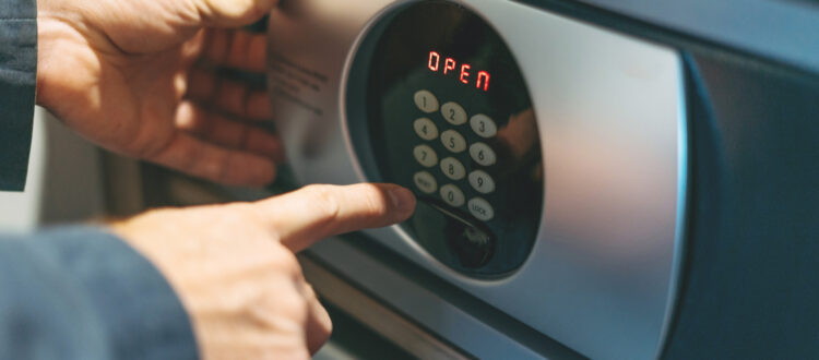 Someone opening a safe.