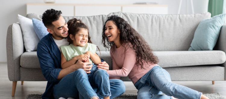 A family laughing together.