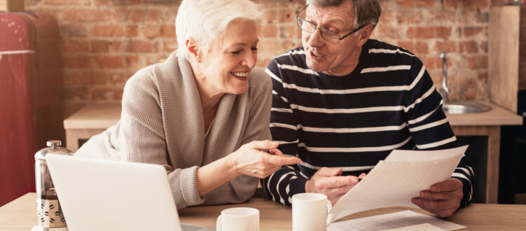 A couple reviewing paperwork.