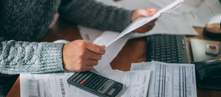 A man looking at some paperwork.