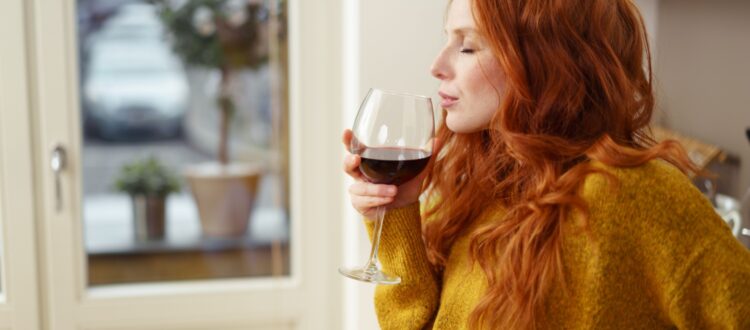 Woman enjoying a glass of wine