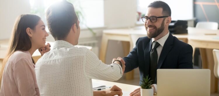 A couple meeting with a financial planner.