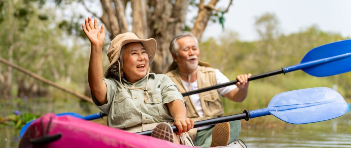 An older couple kayaking.