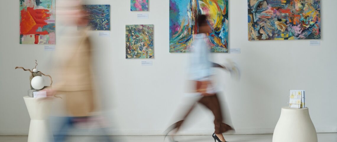People walking through a museum.