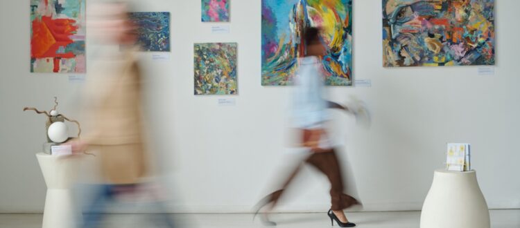 People walking through a museum.