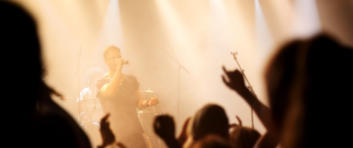 A band on stage at a gig.