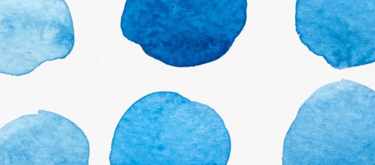 A set of six watercolour blue circles in different shades.