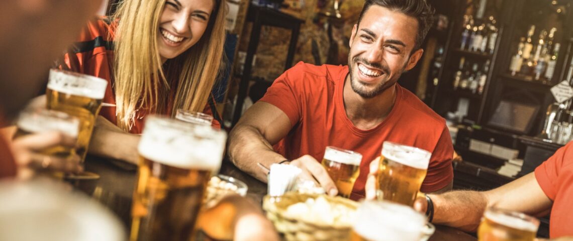 Friends having a drink in the pub.