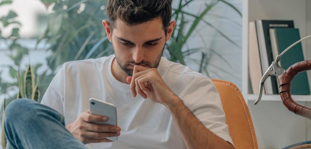 A man using his phone.