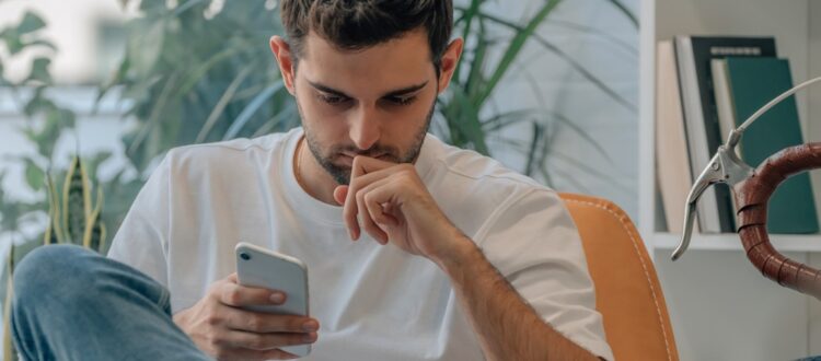 A man using his phone.