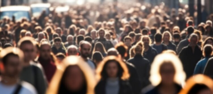 A crowd of people walking.