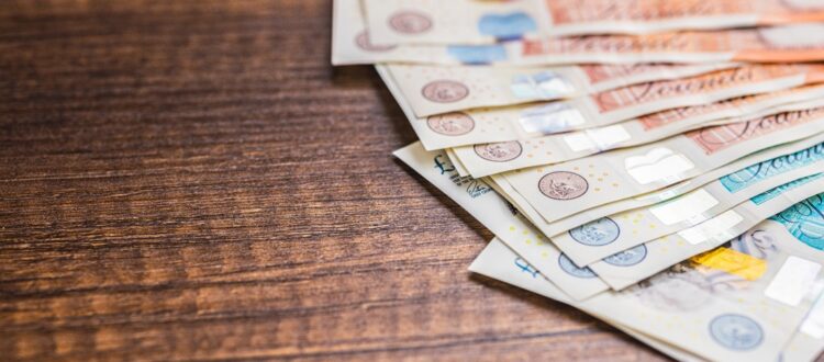 UK bank notes on a table.